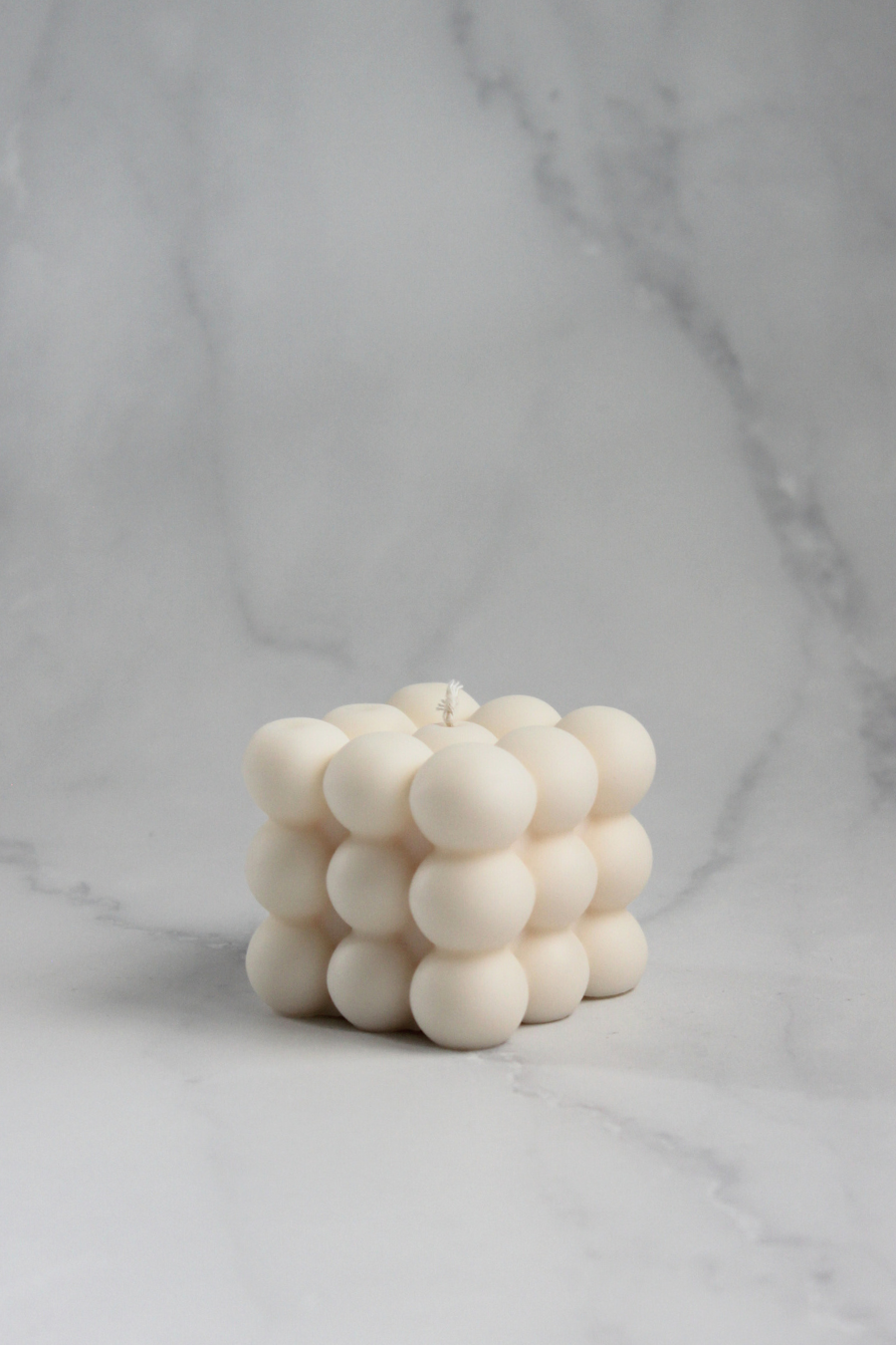 Sweet Dew Bubbly Candle with bold geometric bubble design, handcrafted from natural soy wax in New Zealand