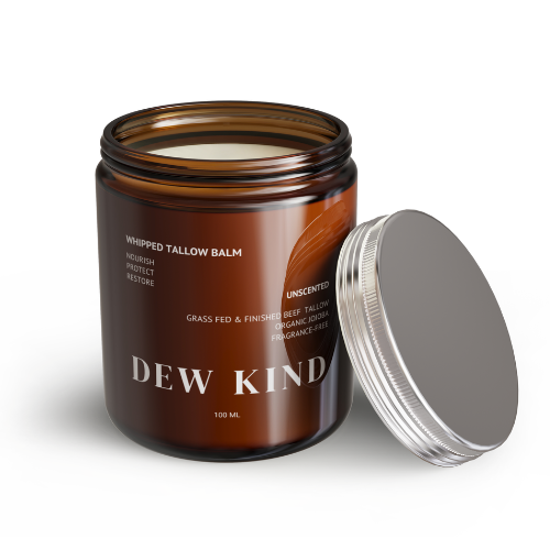 Brown glass jar of Dew Kind Whipped Tallow Balm with silver lid, made with grass-fed NZ tallow and organic jojoba, natural skincare for dry and sensitive skin.