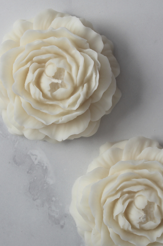 Hand-poured Promise Candle shaped like a blooming peony, crafted from soy wax in Auckland, New Zealand